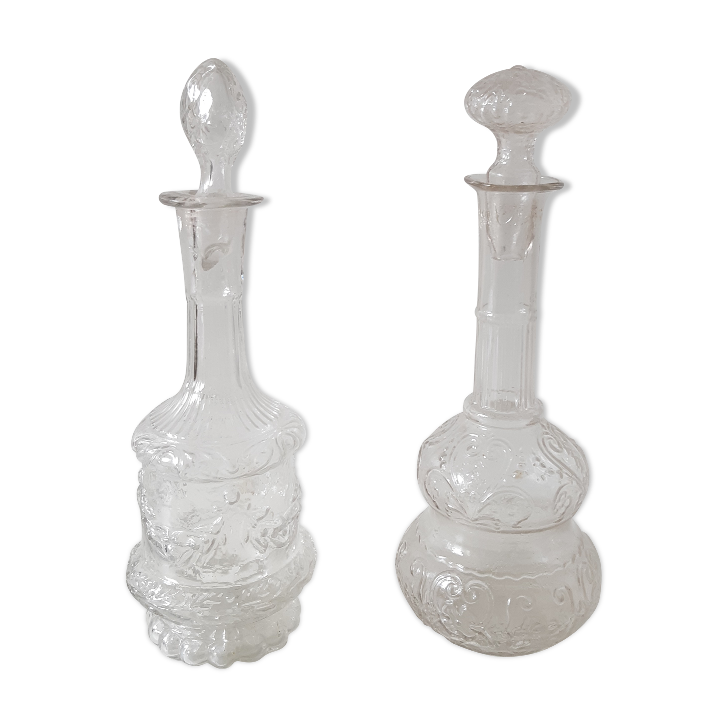 Set of 2 vintage carved glass bottles