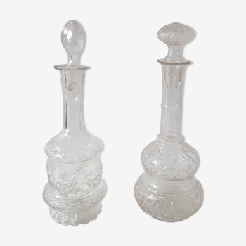 Set of 2 vintage carved glass bottles