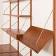 Danish teak wall unit in the style of Cadovius, Sorensen with a lamp, 1970s
