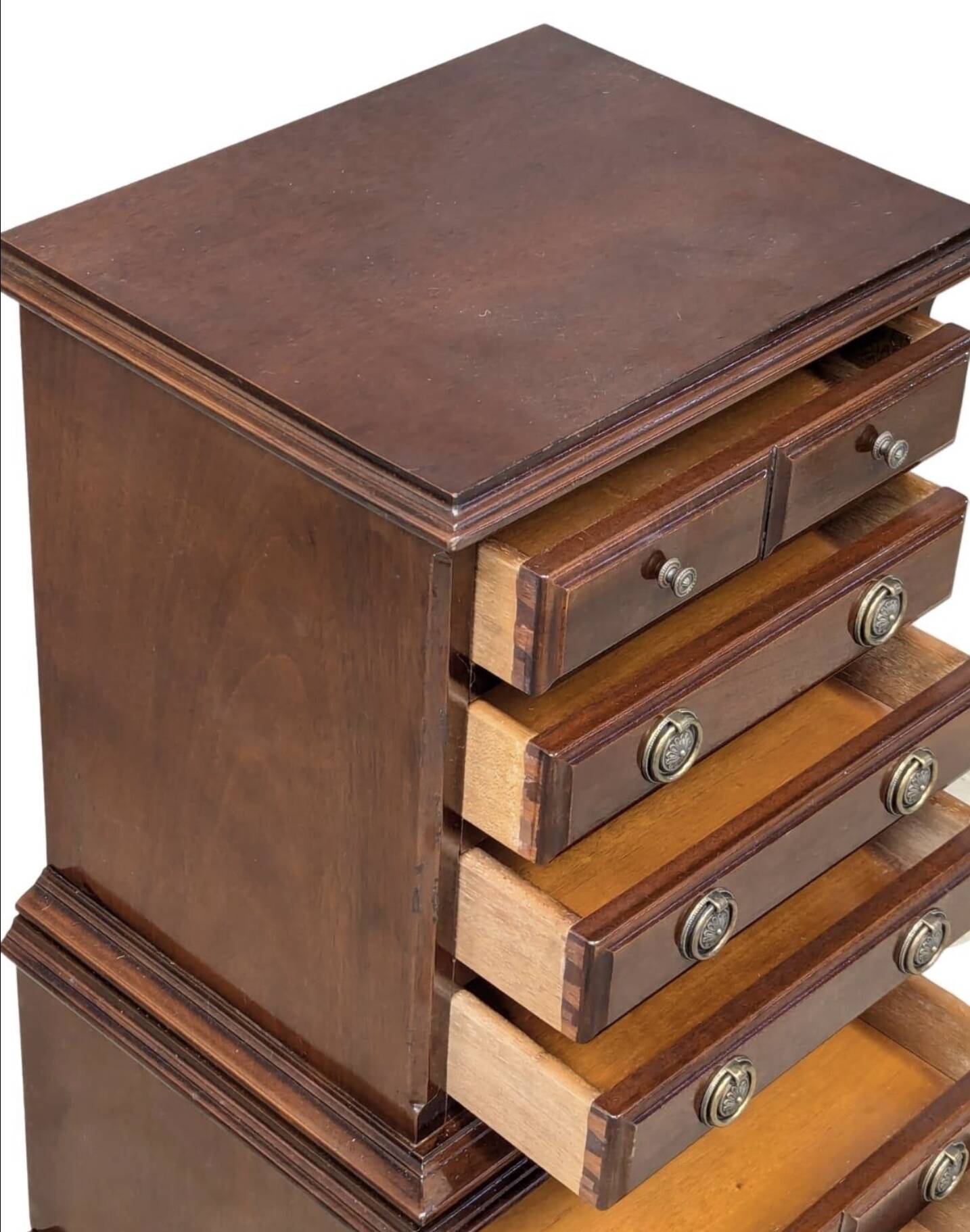 A small Georgian style mahogany chest of drawers