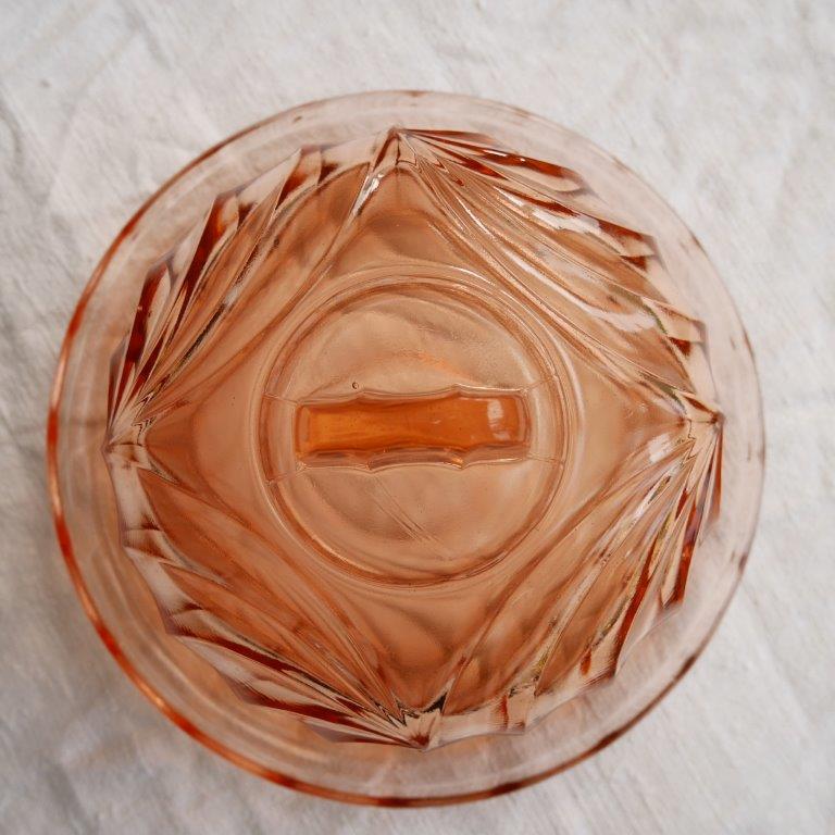 Orange glass bell and its top