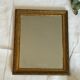 Miroir vintage doré en bois
