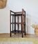 Small antique library in varnished dark oak rattan.