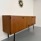 Vintage teak enfilade attributed to Gérard Guermonprez, 1960s design.