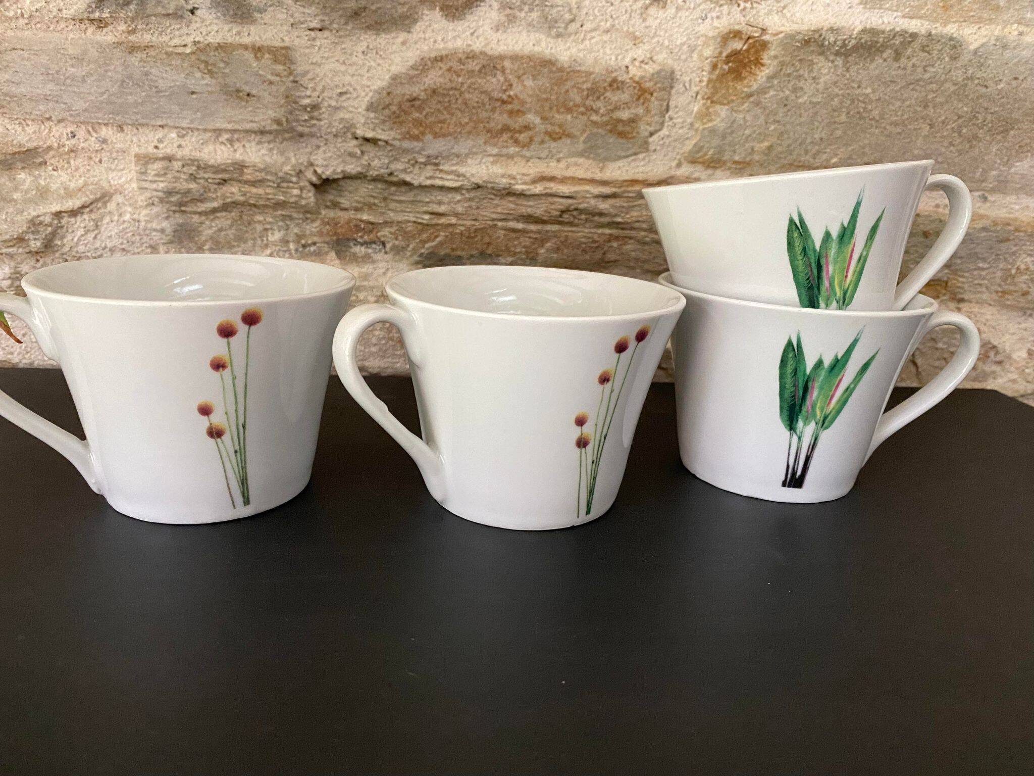 4 fine white porcelain cups with fine flower decoration