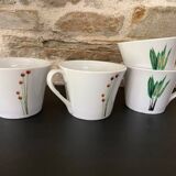 4 fine white porcelain cups with fine flower decoration