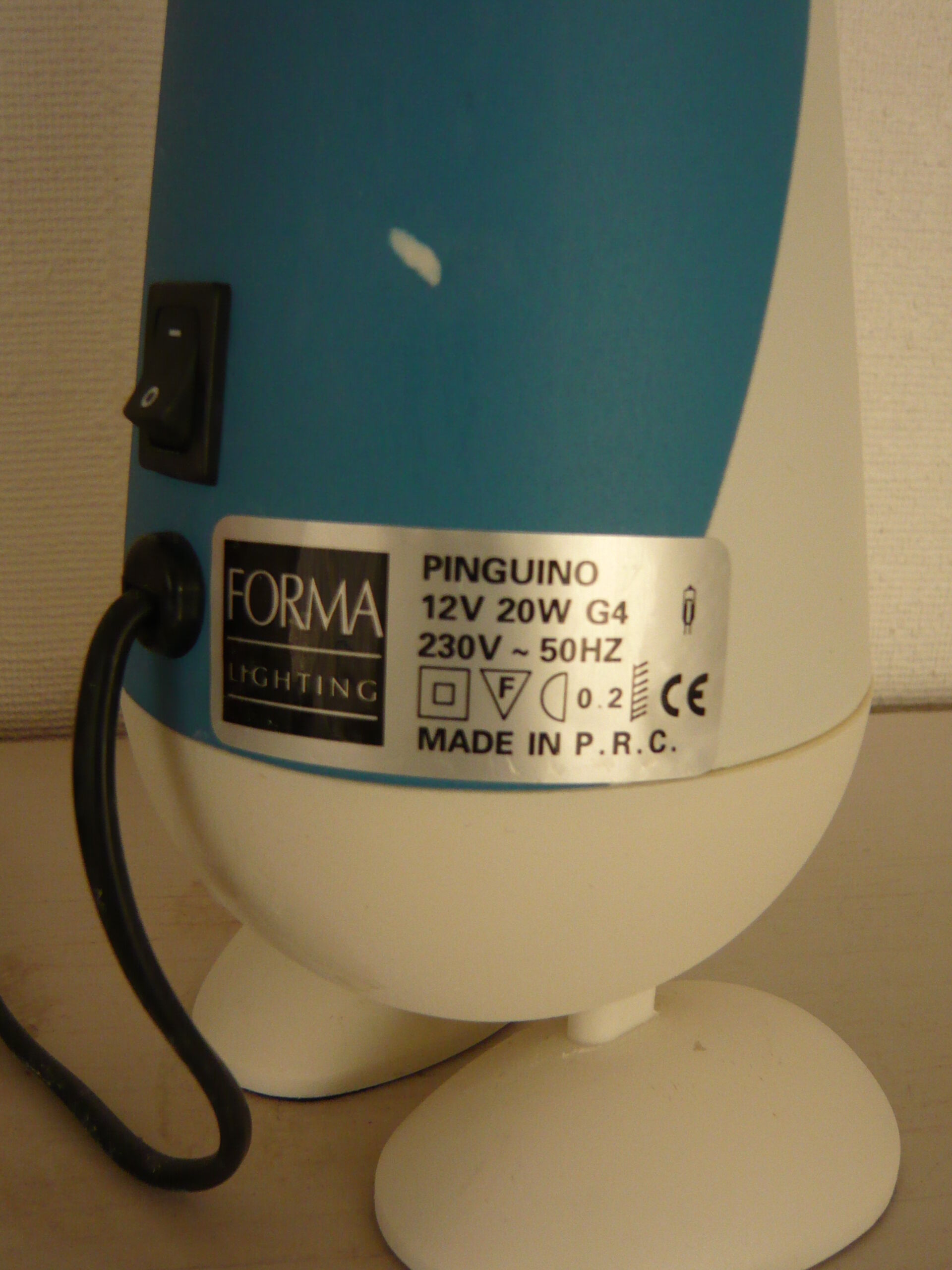 Blue and white penguin lamp