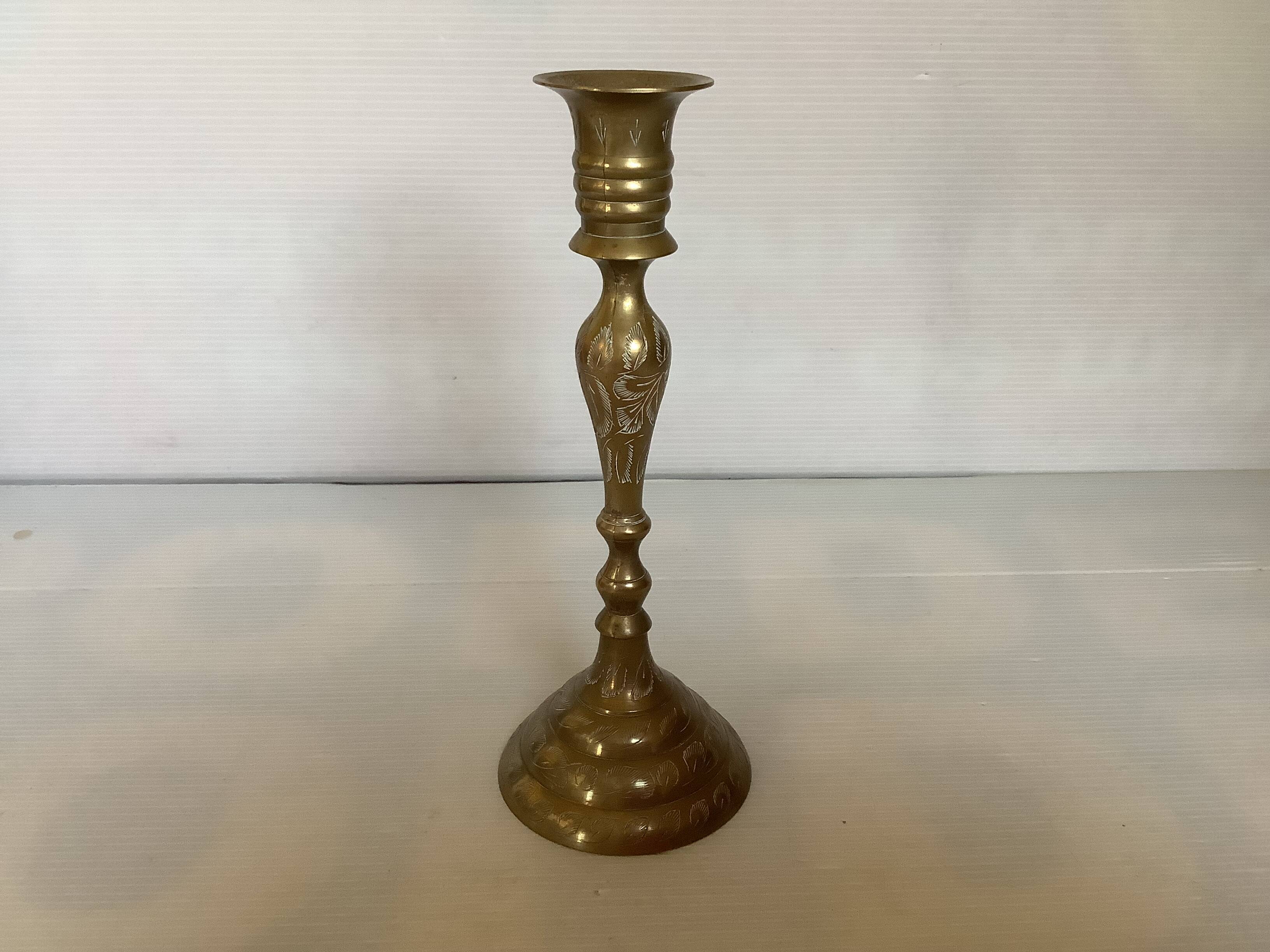 Worked brass candlestick