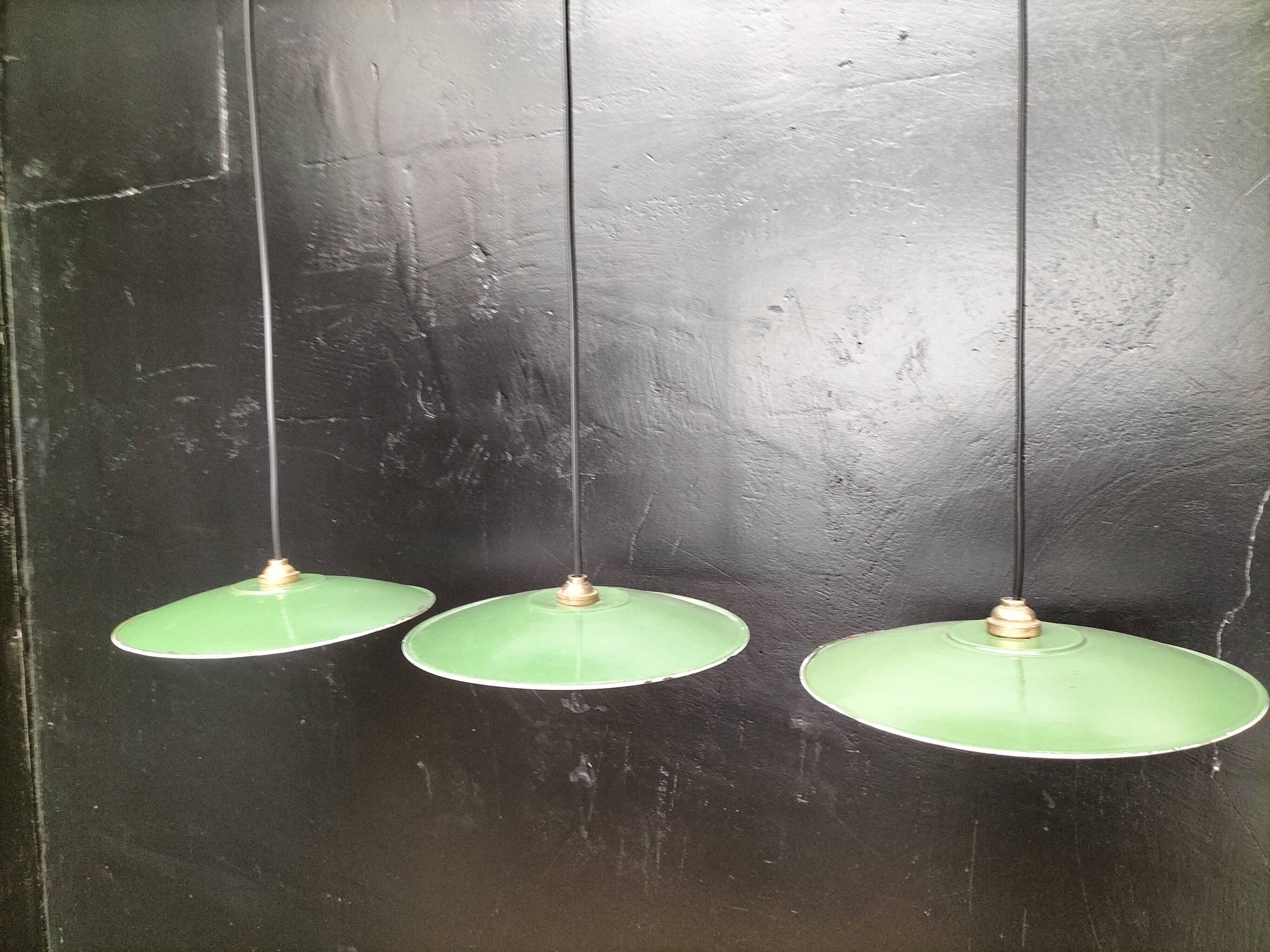 Three enamelled sheet metal suspensions
