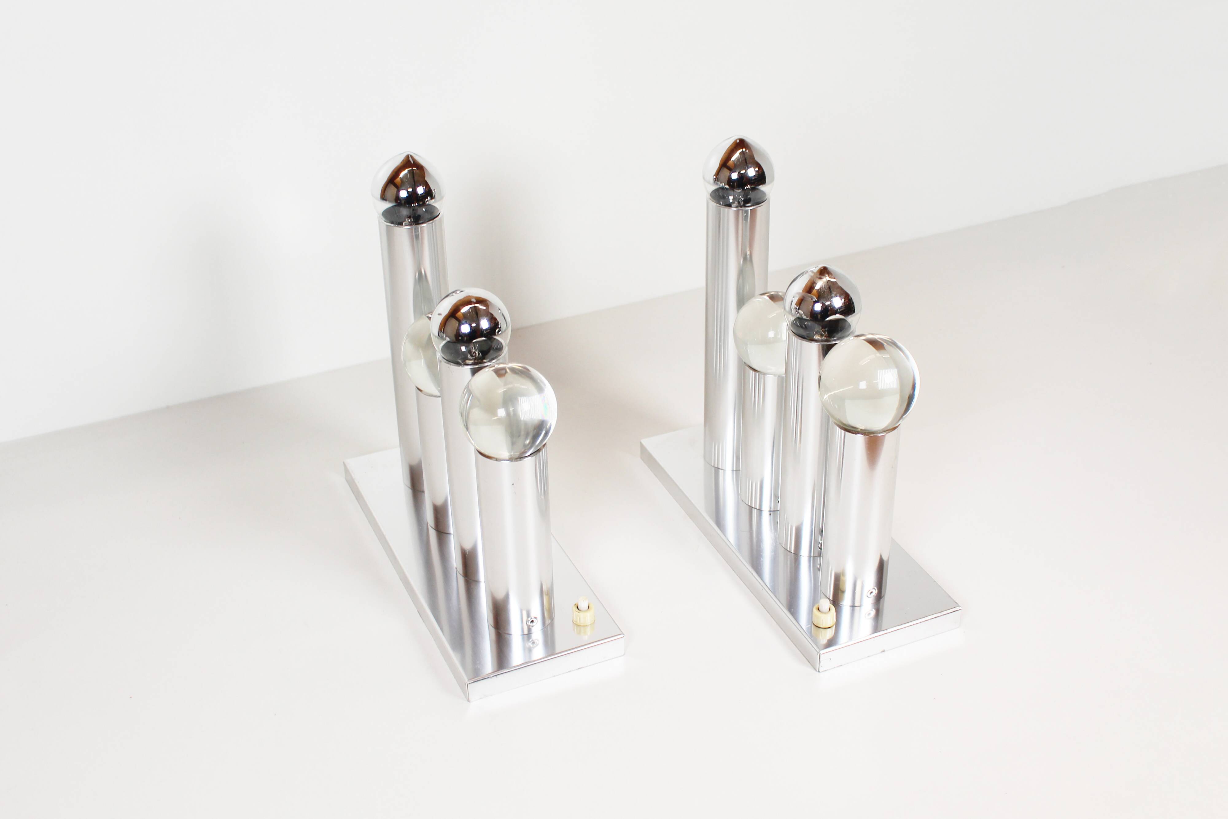 Pair of polished wall lamps by Gaetano Sciolari