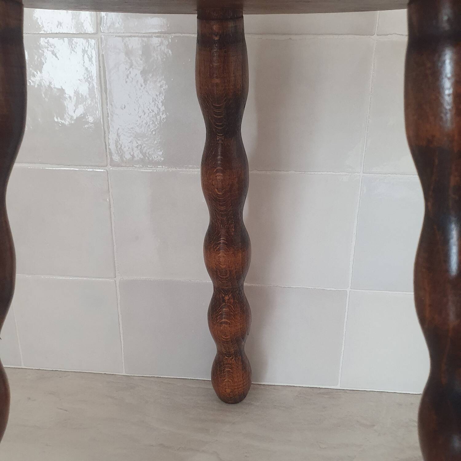 Turned wooden stool / tripod with round seat