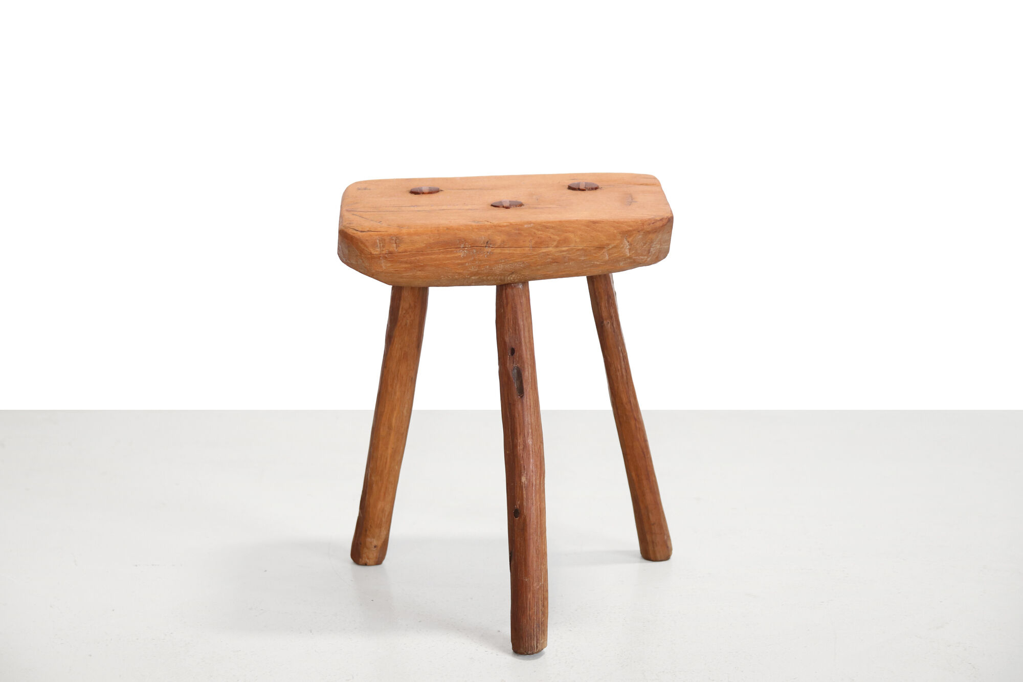 French brutalist tree trunk stools