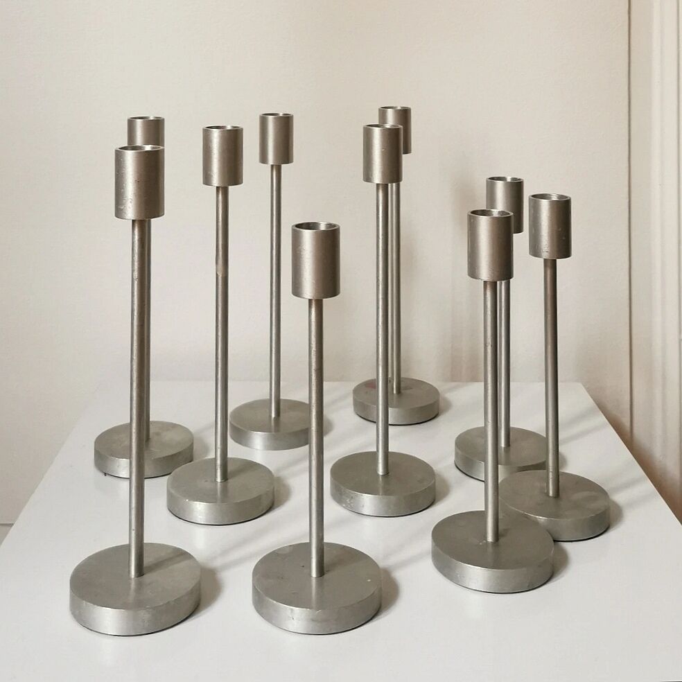 Set of 10 aluminium candle holders.