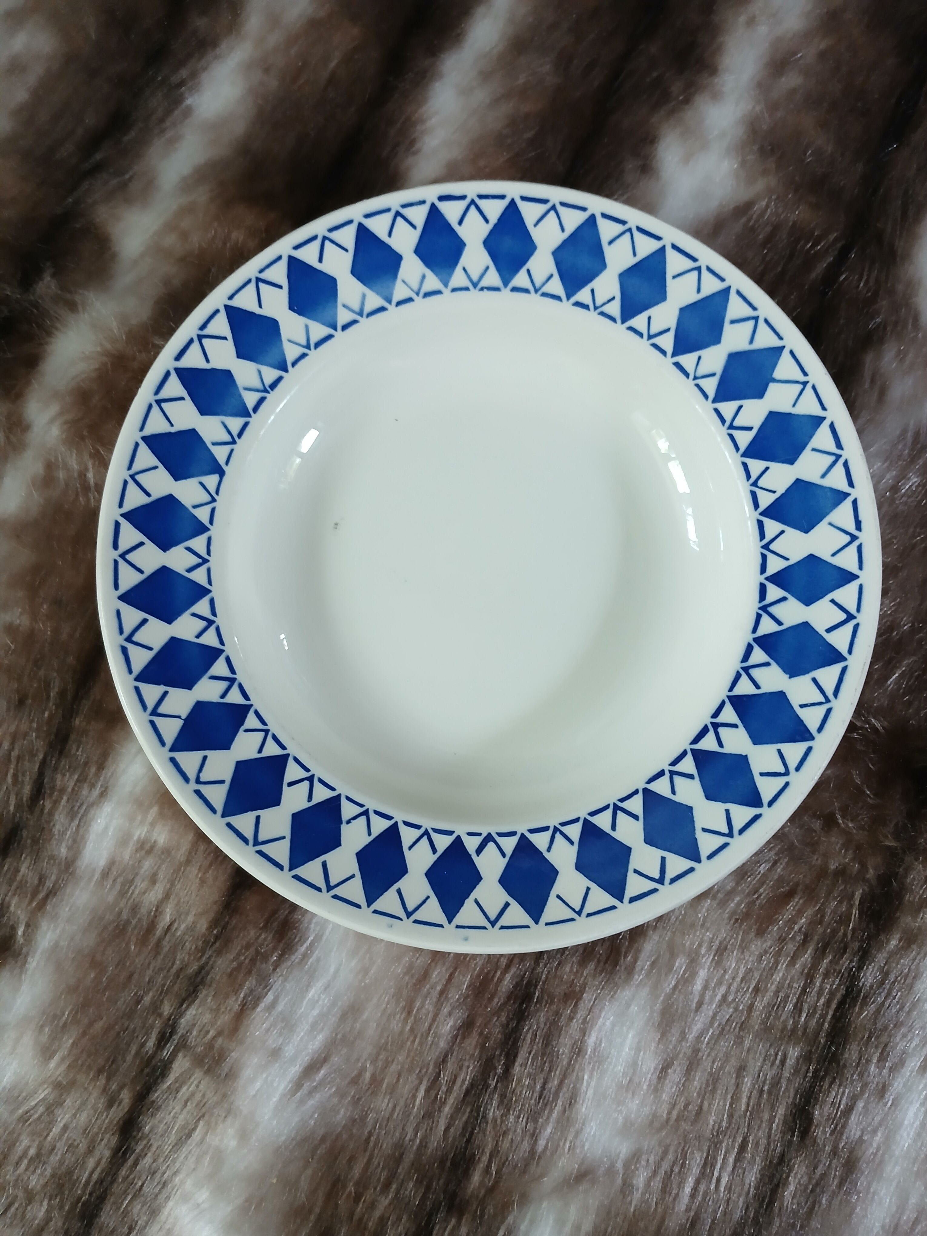8 mismatched antique deep plates