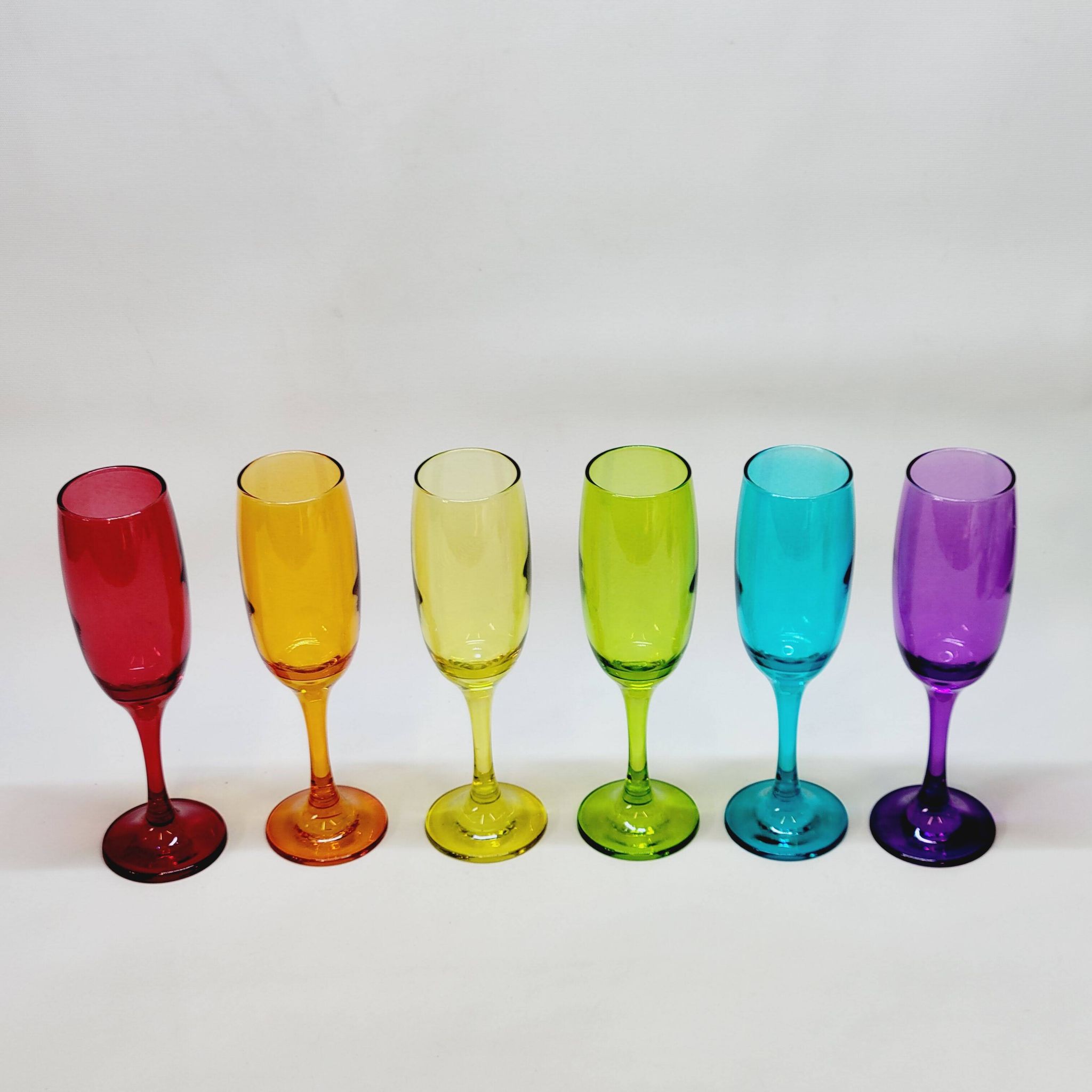 6 multicolored glass champagne flutes red orange yellow green blue purple