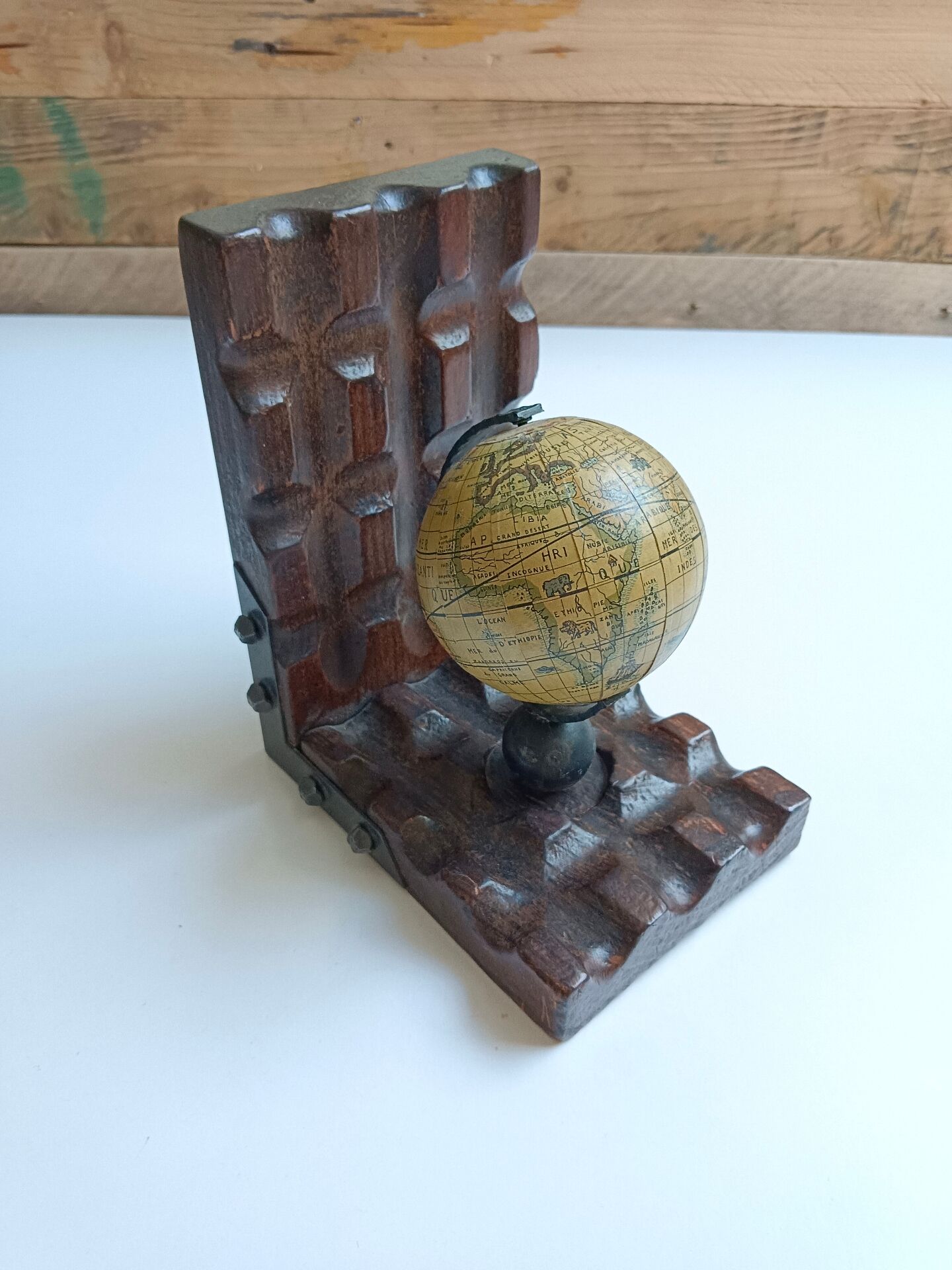 Wooden bookends globe world map