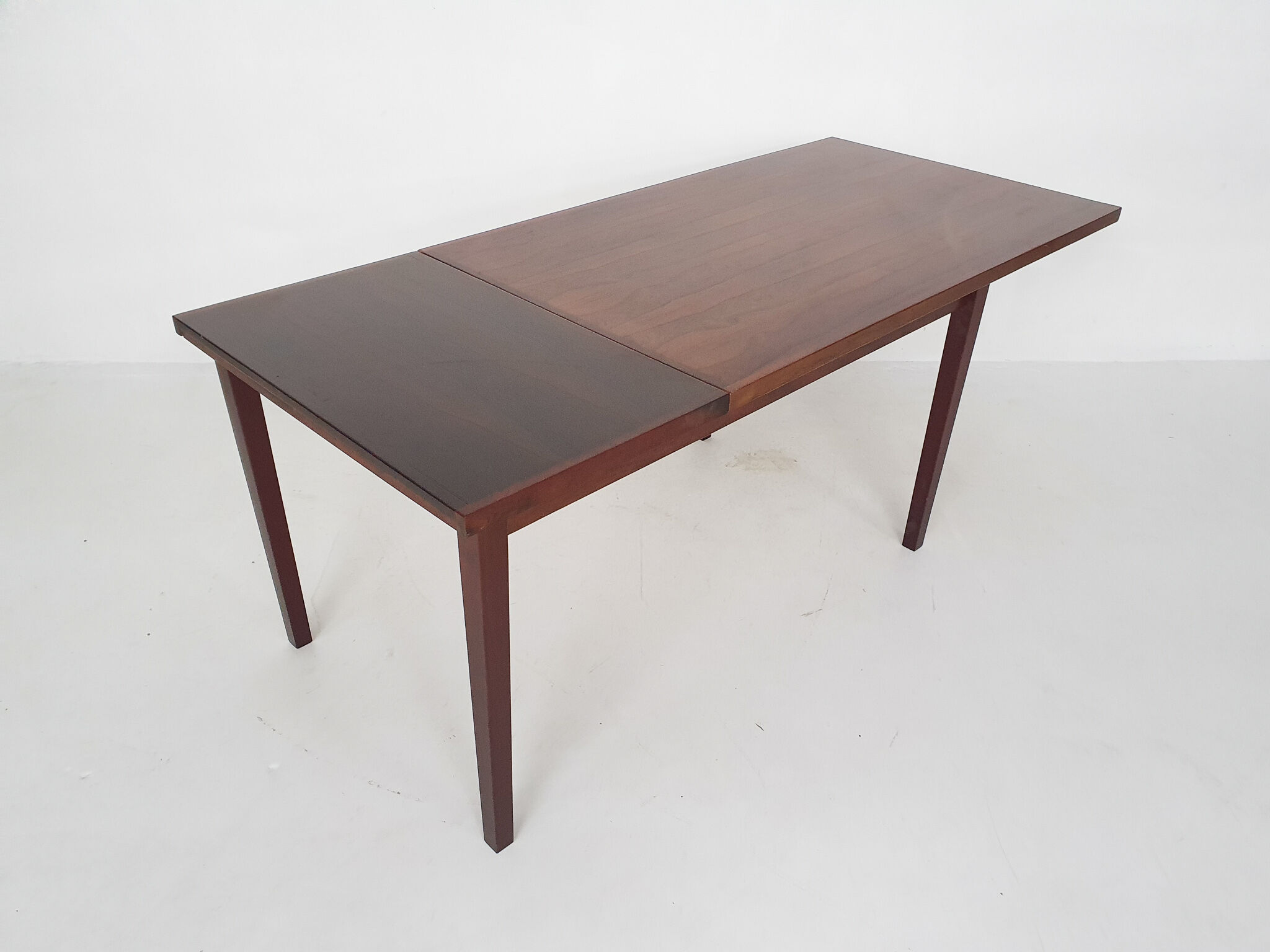Rosewood dining table with one extension leave, 1960's