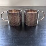 Paire de tasses en argent ciselées