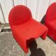 Paire de chauffeuses de marque Atal 1970 rouge