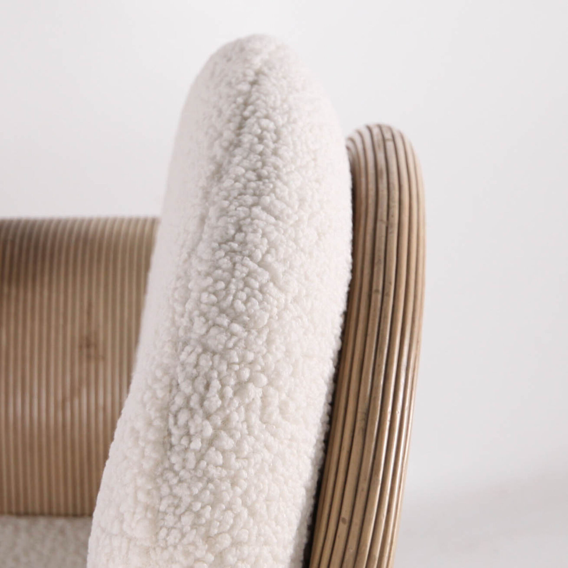 Rattan armchair by Betty Cobonpue
