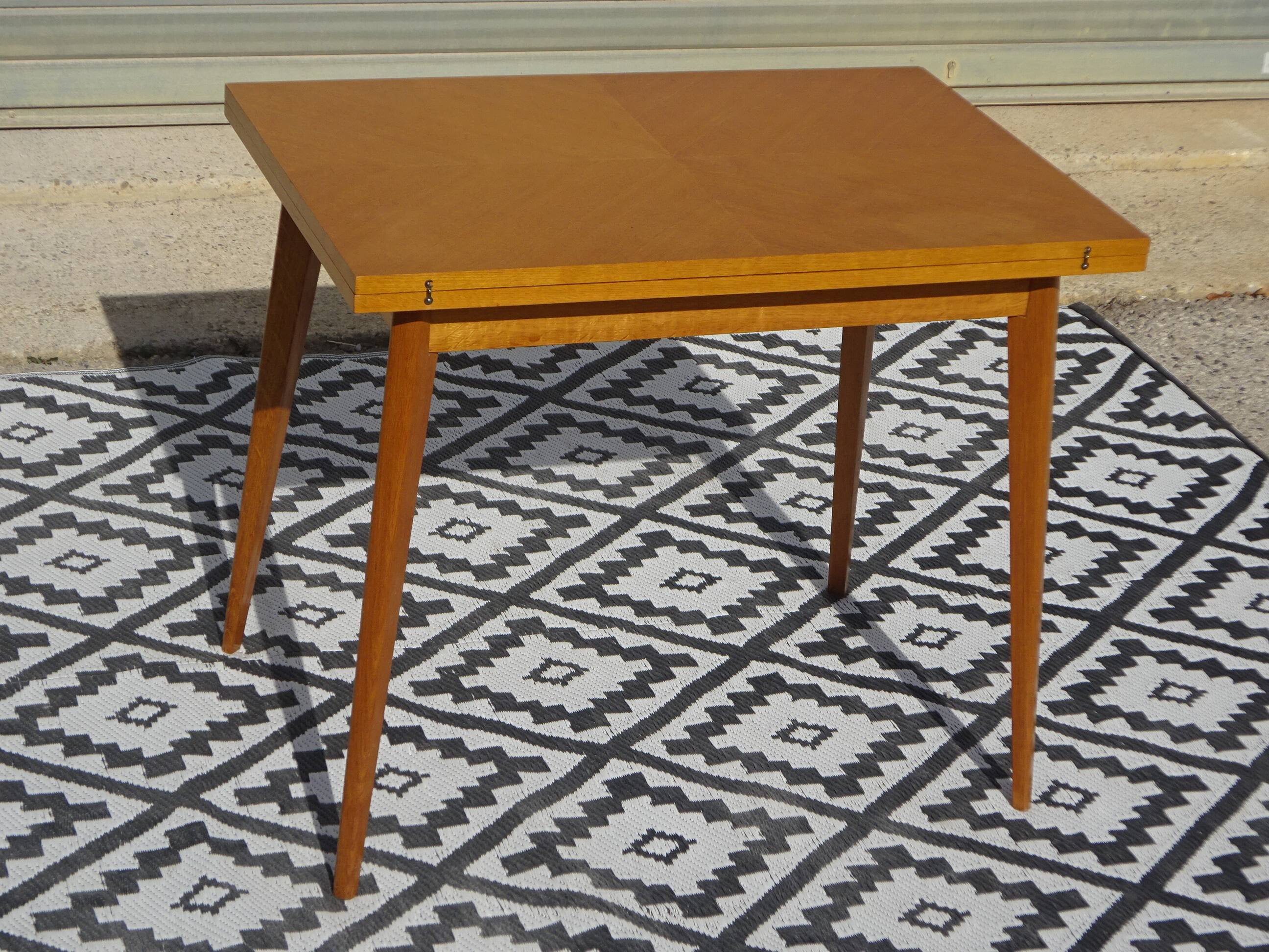Scandinavian portfolio table model "half-century" by SAM