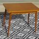 Scandinavian portfolio table model "half-century" by SAM