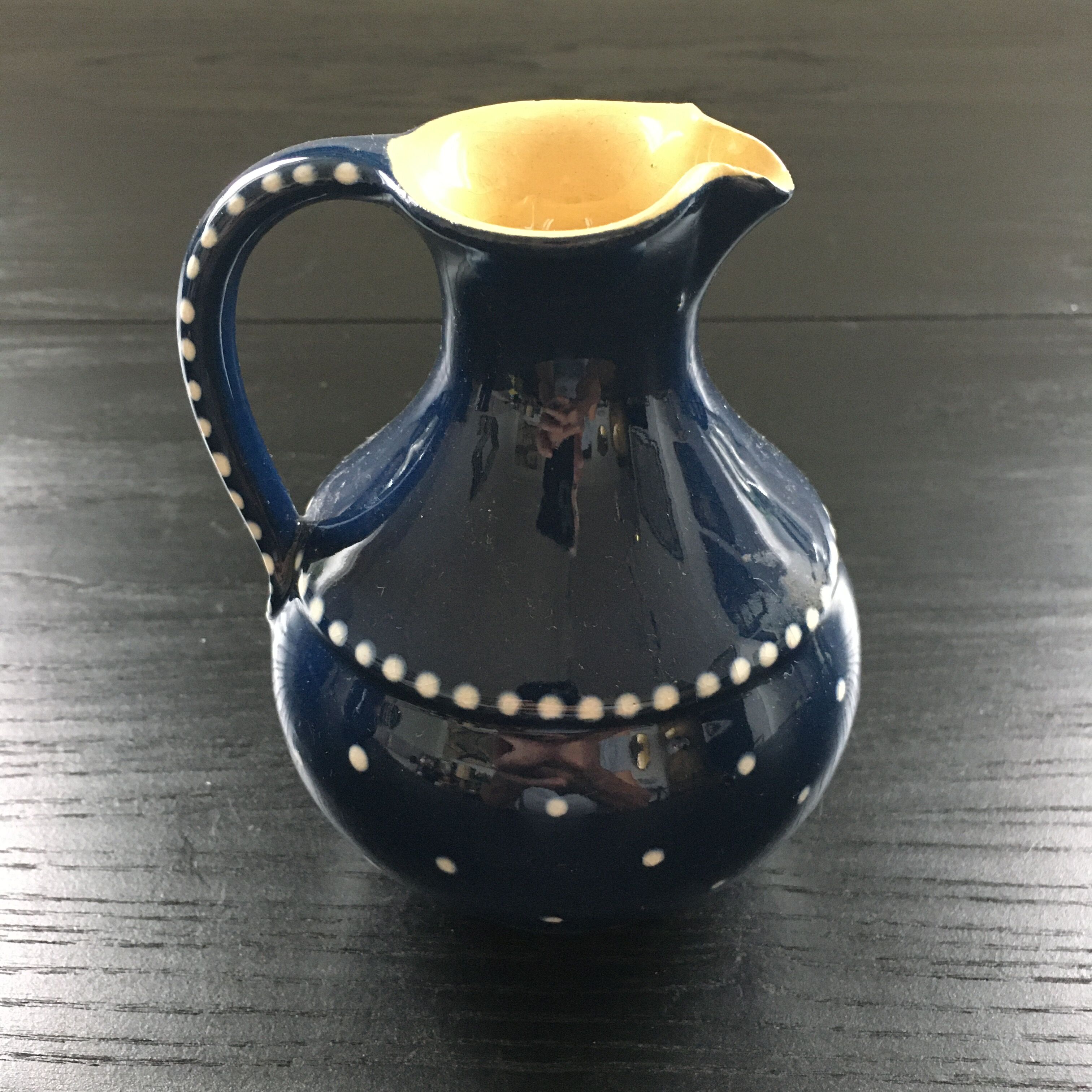 Midnight blue pitcher décor white polka dots