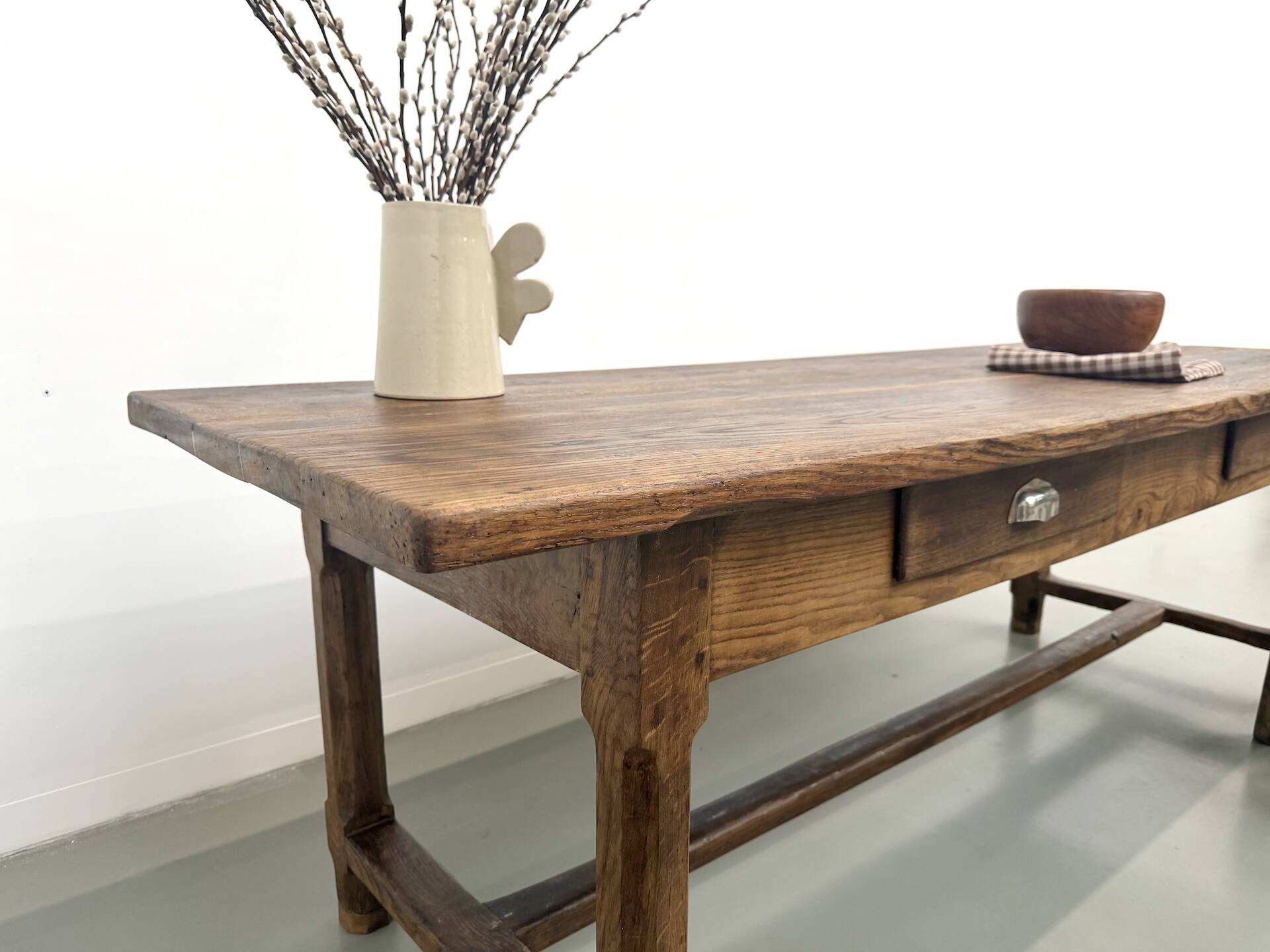 Authentic French farmhouse table from 1890 in solid oak with two drawers.