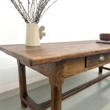Authentic French farmhouse table from 1890 in solid oak with two drawers.