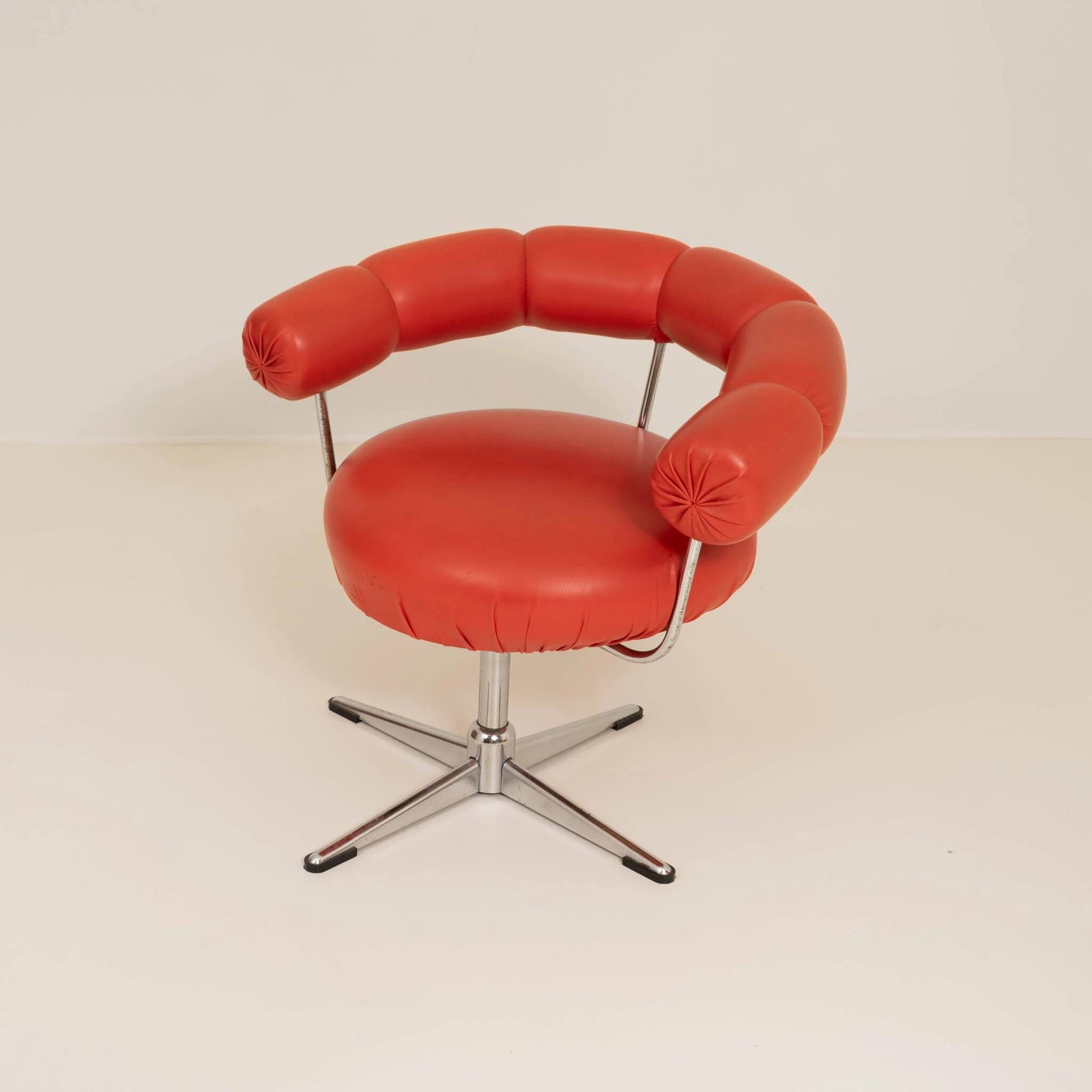 Vintage orange faux leather chair