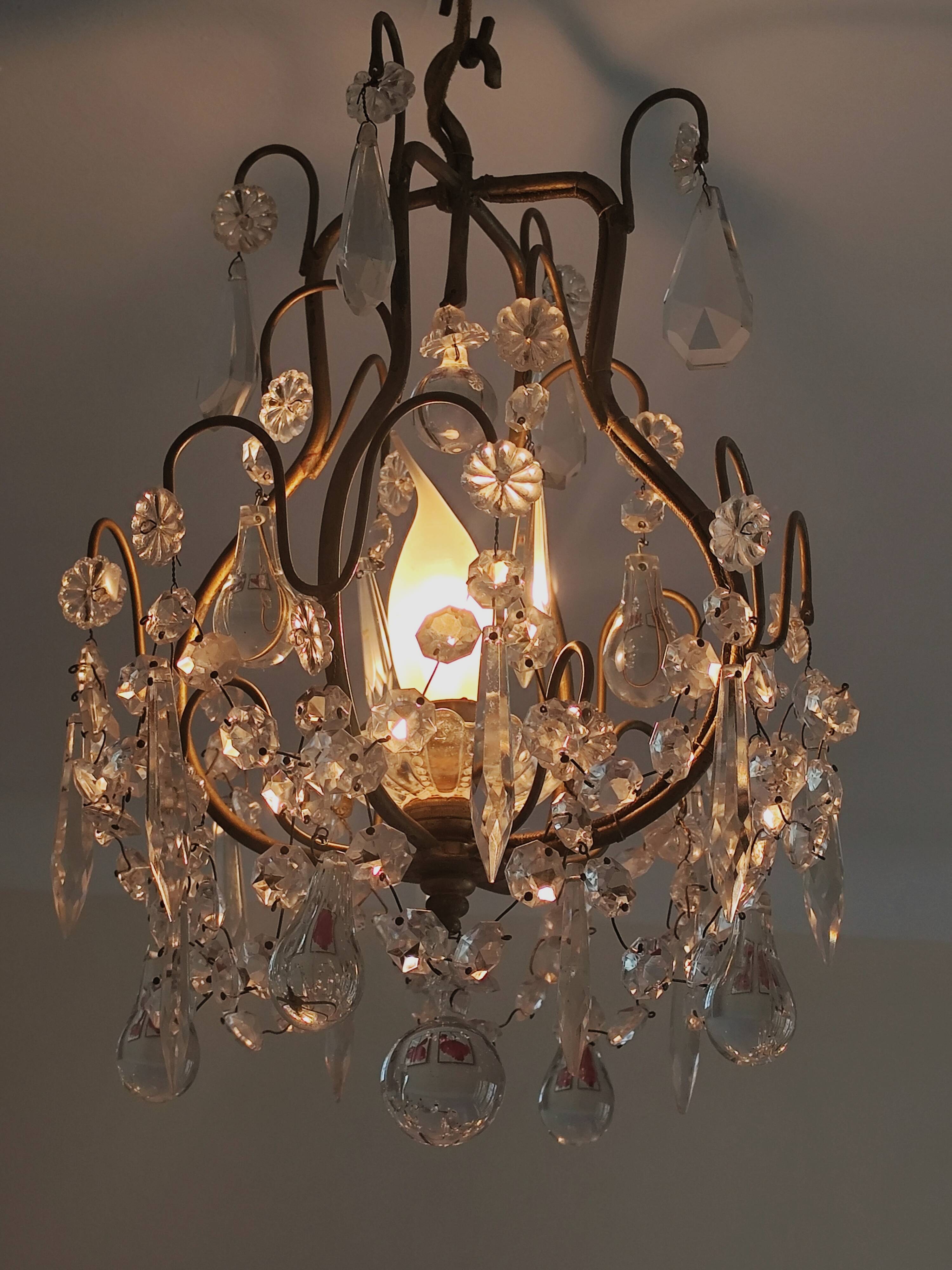 brass cage chandelier with crystal tassels