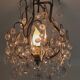 brass cage chandelier with crystal tassels