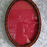 Oval hanging frame in marquetry