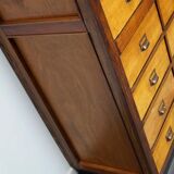 School cabinet bank of vintage Dutch drawers in mid-twentieth century pine