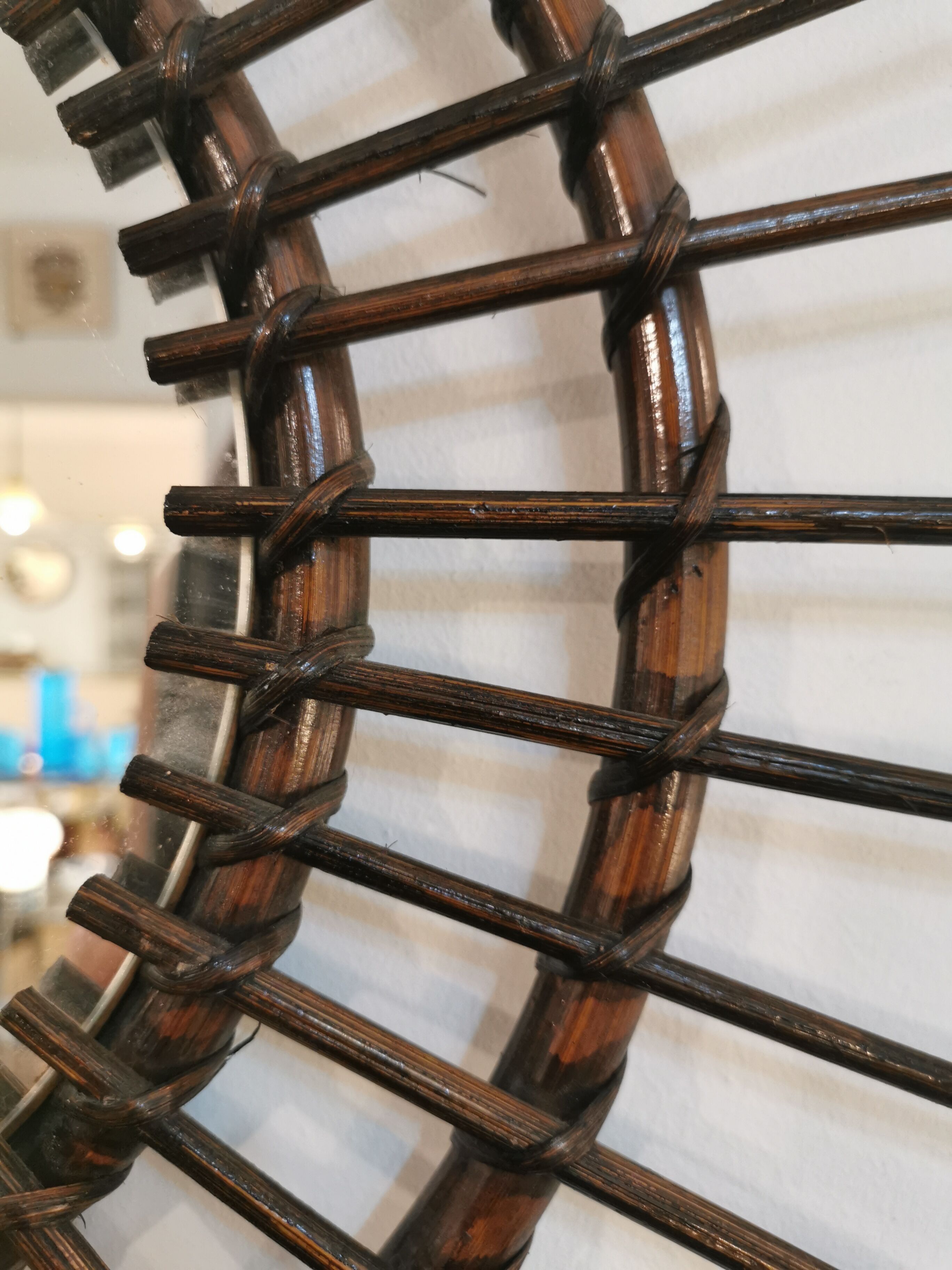 Vintage sun mirror in 60s dark rattan 56cm