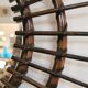 Vintage sun mirror in 60s dark rattan 56cm
