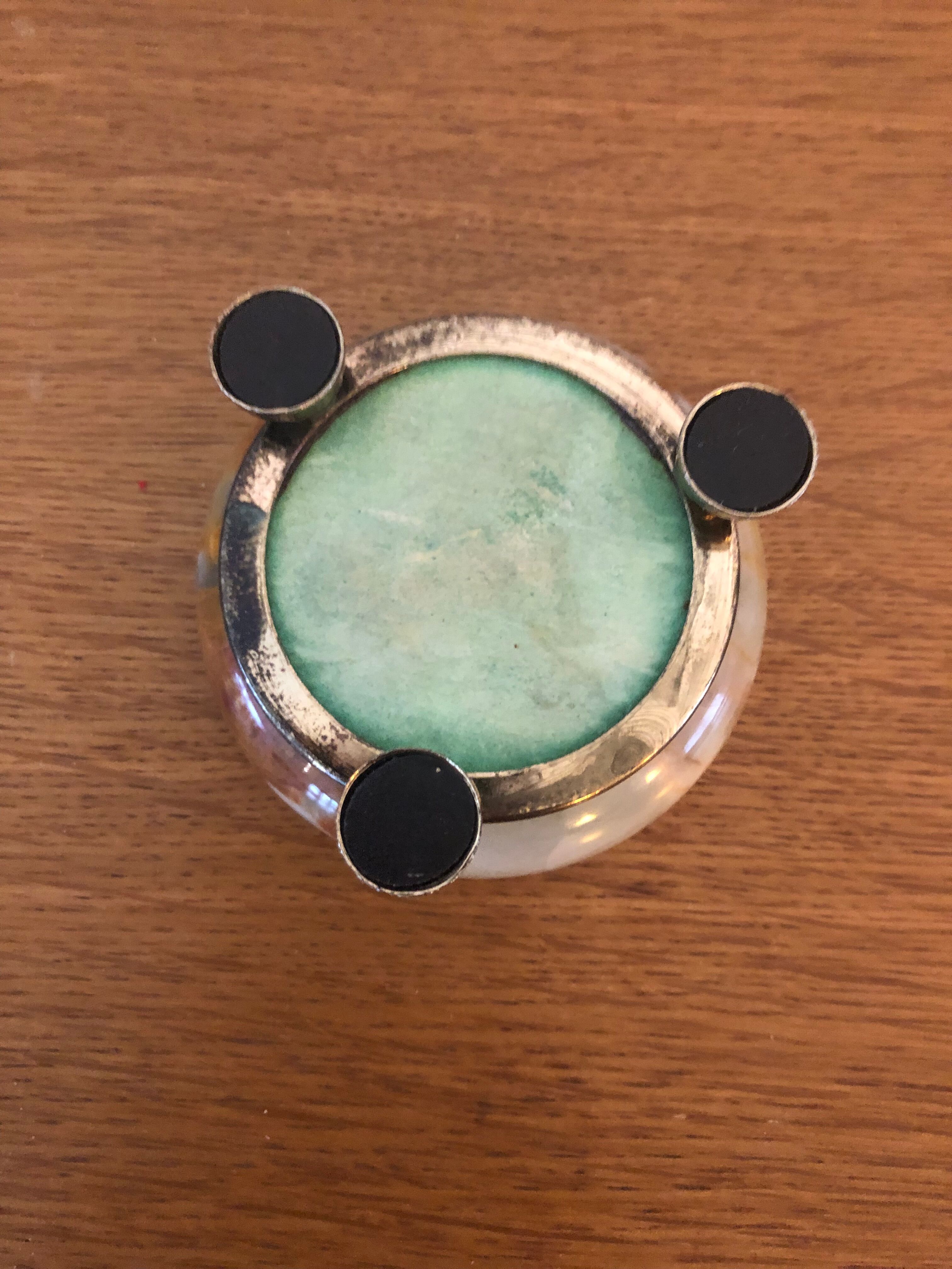 Alabaster pocket ashtray with 3 brass feet