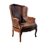 Fauteuil en rotin avec siège en cuir marron
