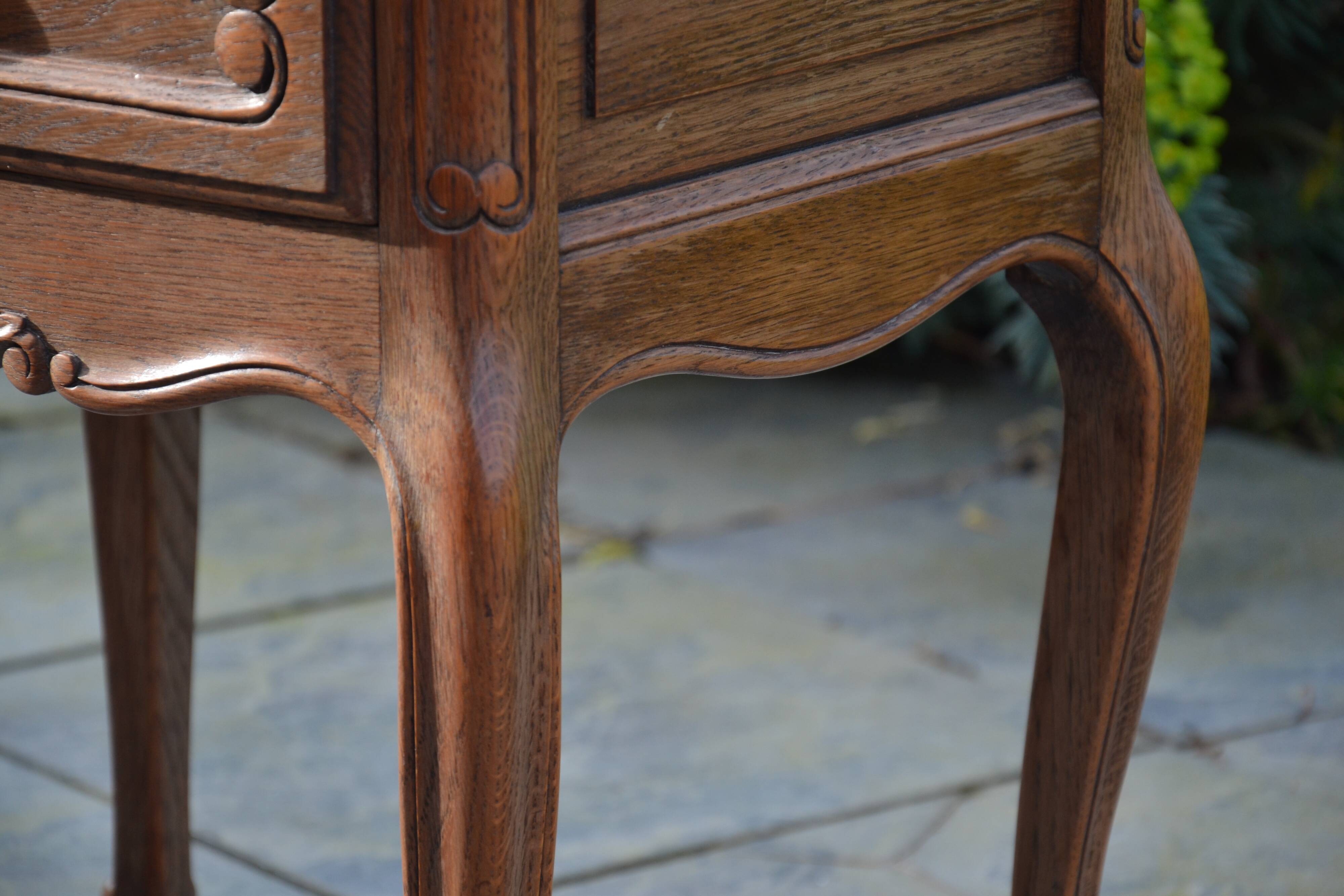 Two oak bedside tables.