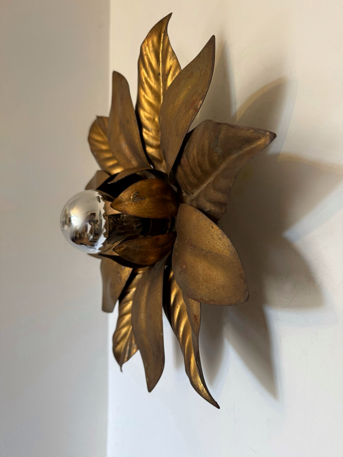 Golden flower wall light from the 70s