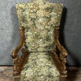Renaissance ceremonial throne chair with slightly curved back in carved walnut