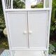 White rattan shelf