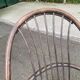 Fauteuil pivotant en rotin et coussin velours marron années 70