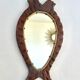 Brutalist mirror in wood and rope, free form.
