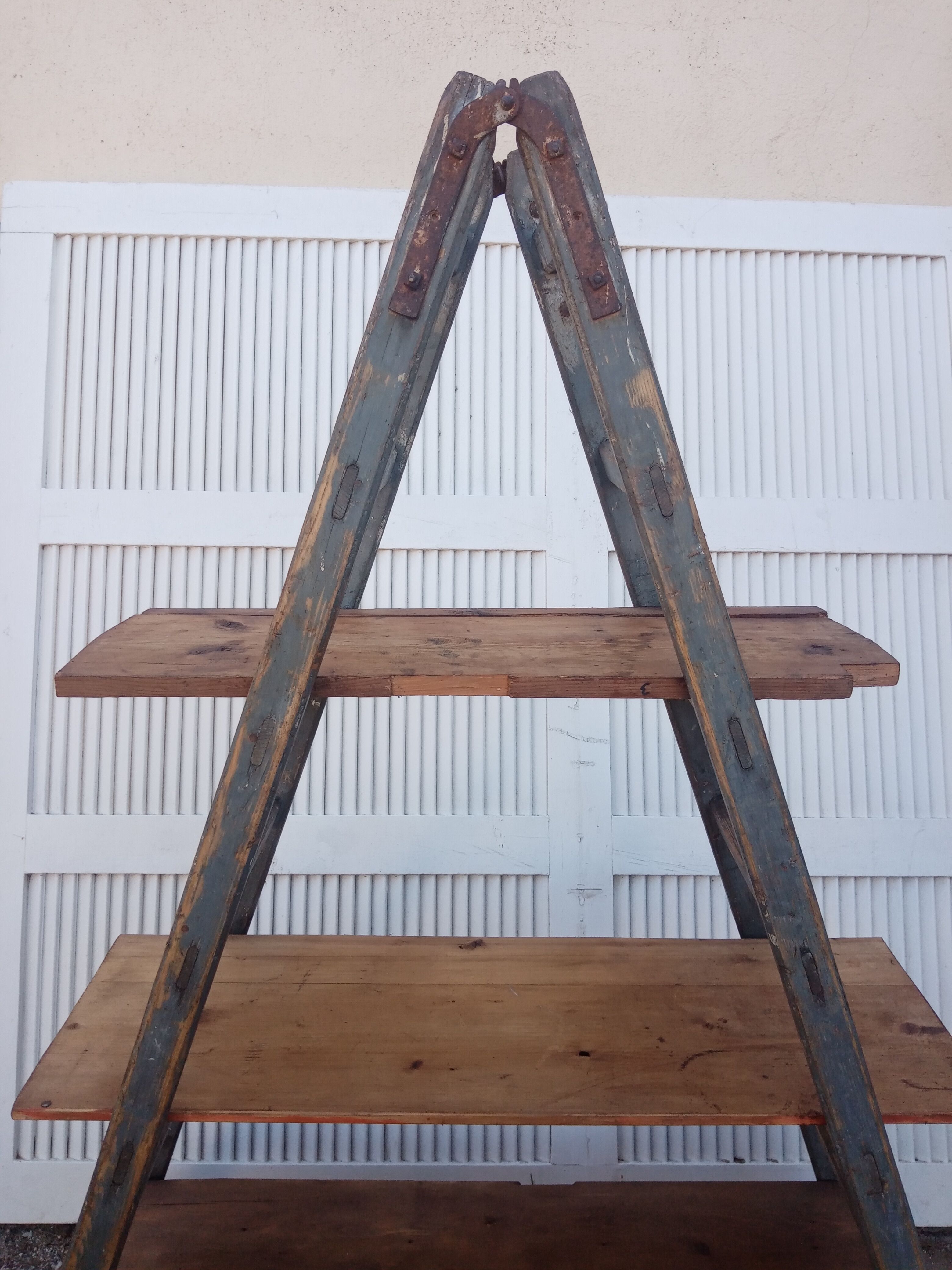Old stepladder wooden shelf