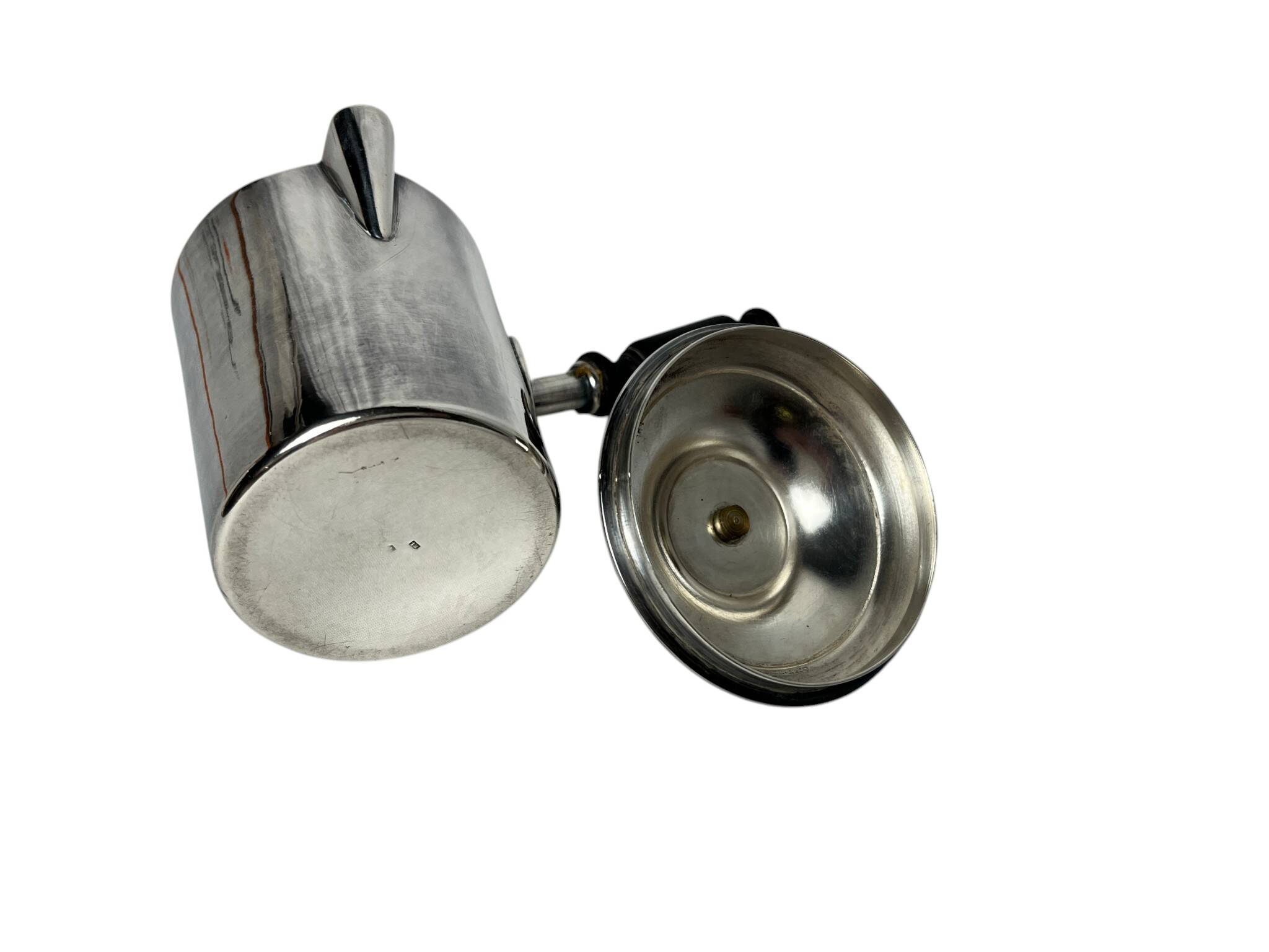 Tableware, marabout milk jug in silver-plated metal and wood from the early 20th century.