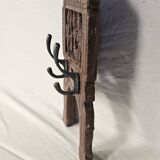 Coat rack with 2 hooks on a frieze of divinities in teak