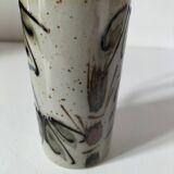 Glazed stoneware mug with free decoration, vintage pottery work.