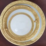 Porcelain plates and bowls of Limoges gold decoration