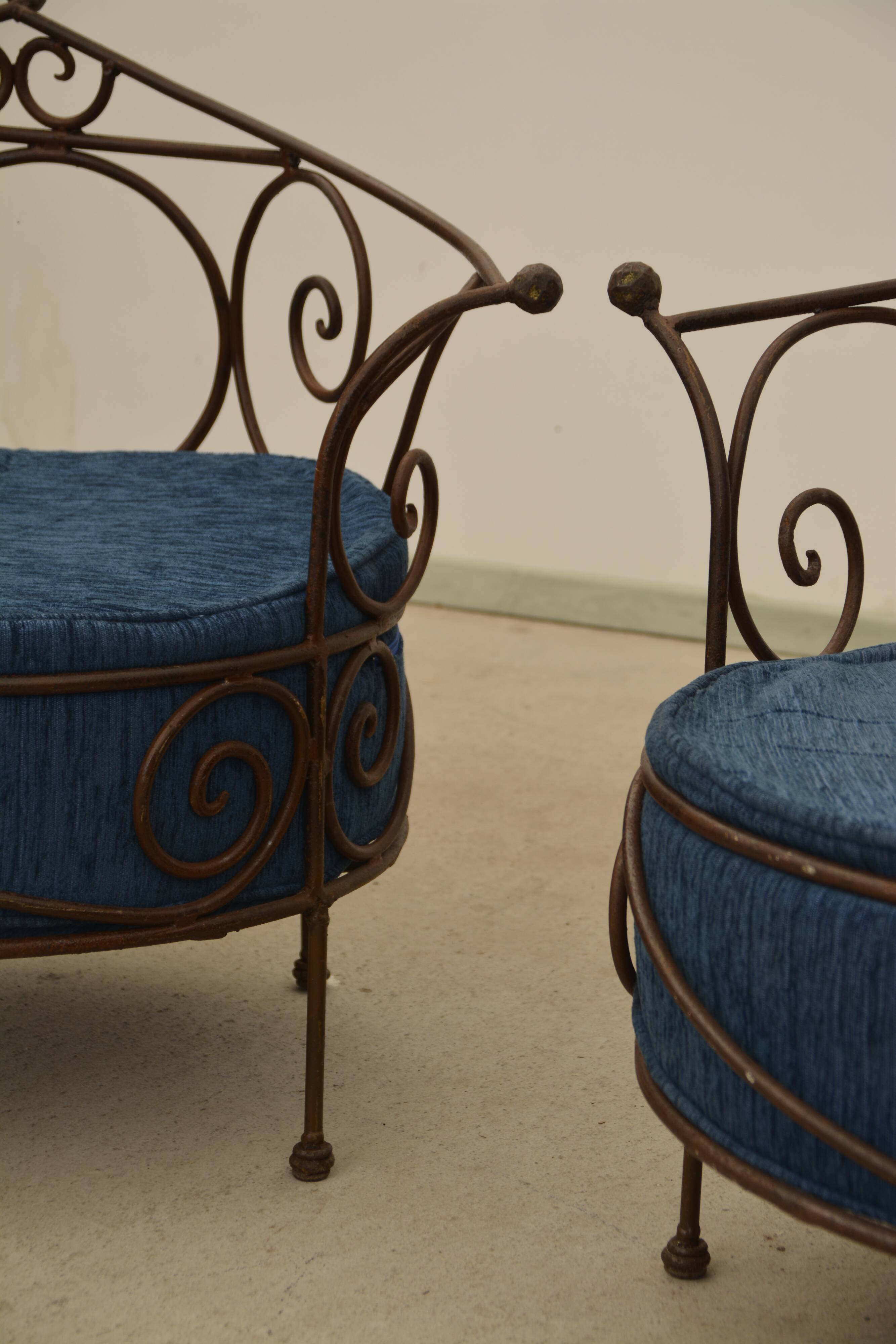 Wrought iron armchairs